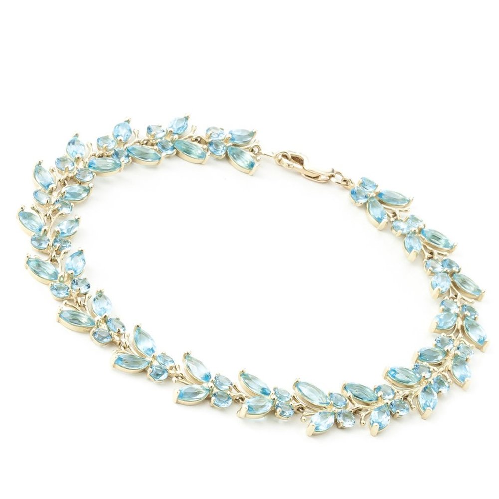 14K. SOLID GOLD BUTTERFLY BRACELET WITH BLUE TOPAZ